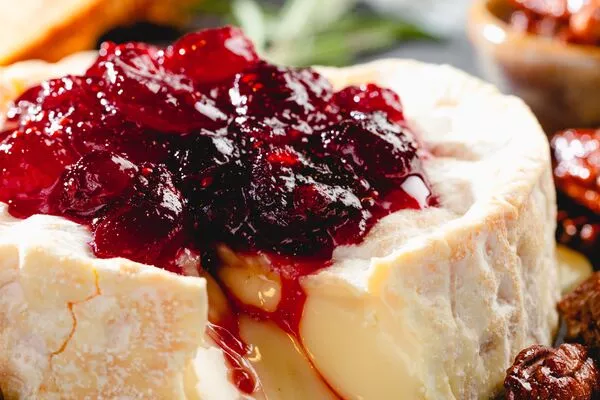 c&h light brown sugar cranberry sauce with baked brie and candied pecans