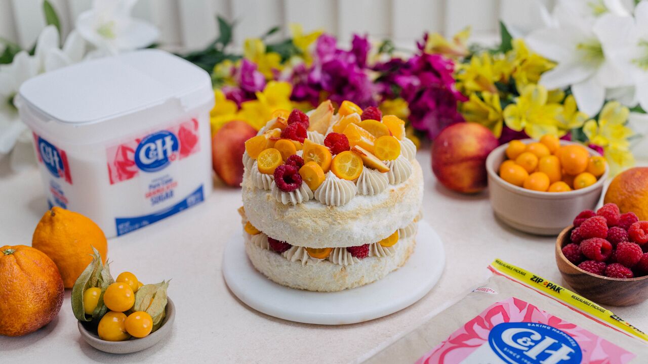 Angel Food Cake with Brown Sugar Buttercream & Fresh Fruit Garnish